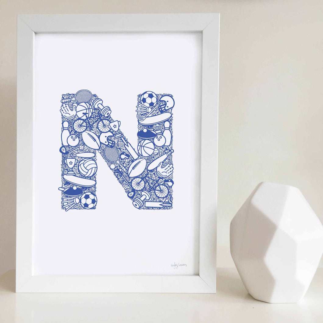 The Sporty letter 'N' artwork was illustrated by Hayley Lauren in Melbourne, Australia. It is the perfect artwork for a child's room that loves sports!