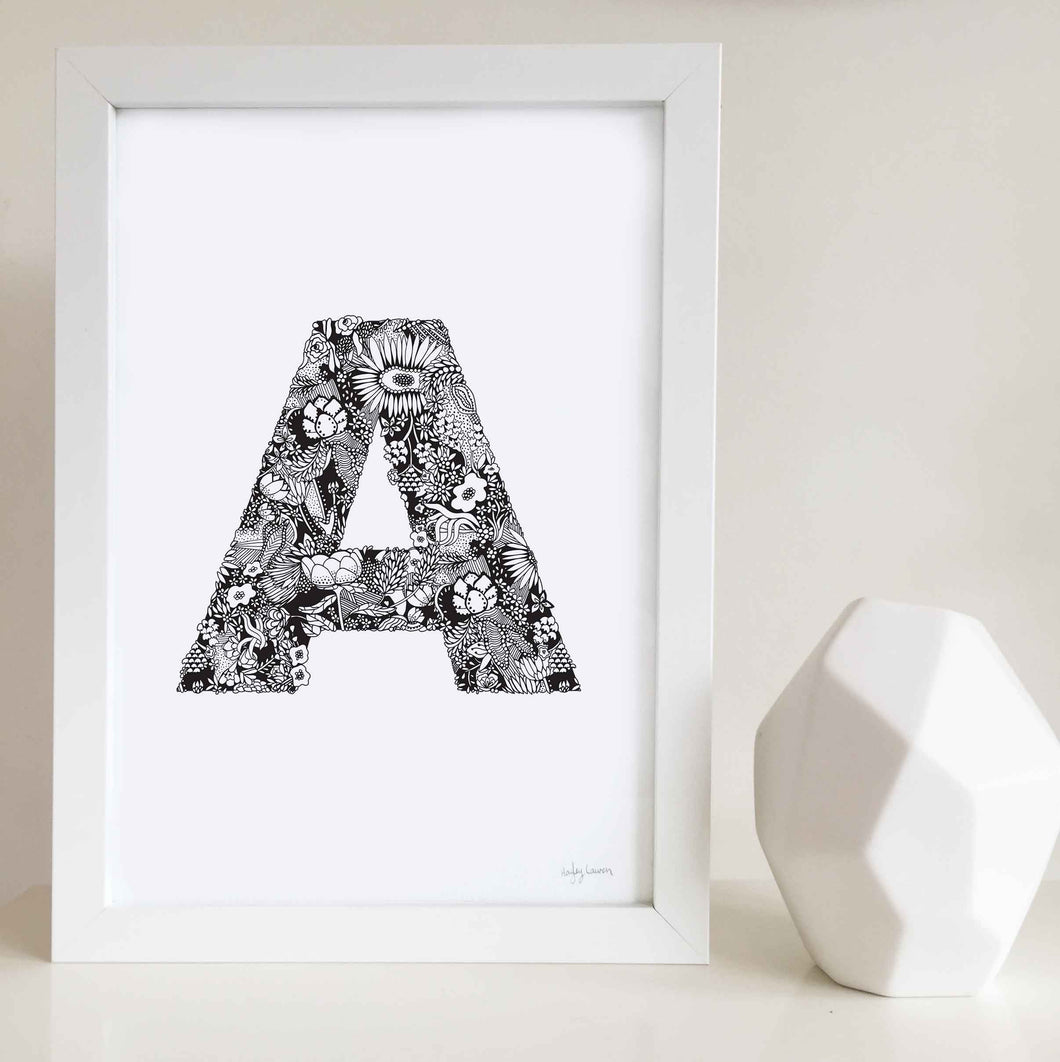 The floral letter 'A' artwork was illustrated by Hayley Lauren in Melbourne, Australia. It is the perfect artwork to personalise a nursery or kids bedroom.