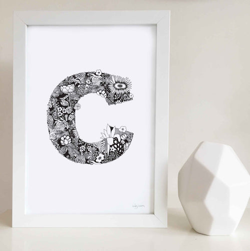 The floral letter C artwork was illustrated by Hayley Lauren in Melbourne, Australia. It is the perfect artwork to personalise a nursery or kids bedroom. 
