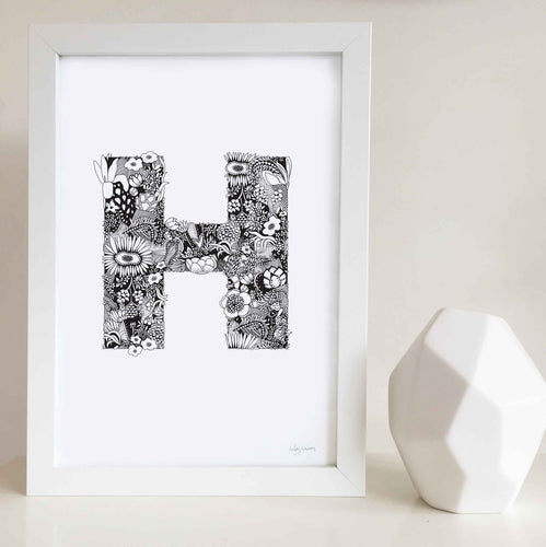 The floral letter 'H' artwork was illustrated by Hayley Lauren in Melbourne, Australia. It is the perfect artwork to personalise a nursery or kids bedroom for a girl who starts with the letter H. Hayley, Holly, Helen, Harriet, Hannah