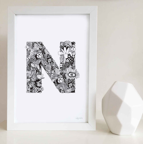 The floral letter 'N' artwork was illustrated by Hayley Lauren in Melbourne, Australia. It is the perfect artwork to personalise a nursery or kids bedroom. 