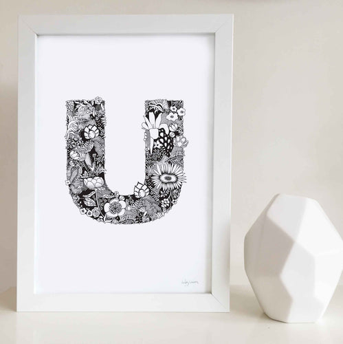 The floral letter 'U' artwork was illustrated by Hayley Lauren in Melbourne, Australia. It is the perfect artwork to personalise a nursery or kids bedroom. 