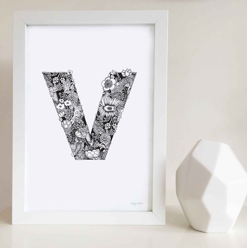 The floral letter 'V' artwork was illustrated by Hayley Lauren in Melbourne, Australia. It is the perfect artwork to personalise a nursery or kids bedroom. 