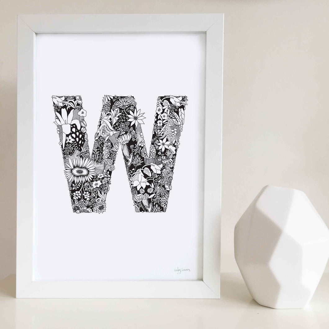 The floral letter 'W' artwork was illustrated by Hayley Lauren in Melbourne, Australia. It is the perfect artwork to personalise a nursery or kids bedroom. 